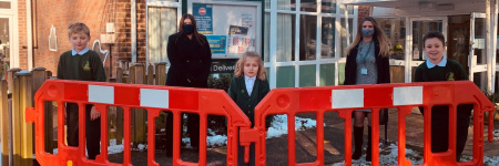 THANK-YOU: Children at Fernhurst Primary School in Fernhurst, Haslemere, can play more safely in the playground during the pandemic, thanks to 15 social-distancing barriers donated by Trant Engineering. Headteacher Jen Thornton is pictured left with Emma Quinnell-Spencer, a Compliance Advisor at Trant Engineering, along with Emma’s son Stuart, right, Emilia and Arthur.