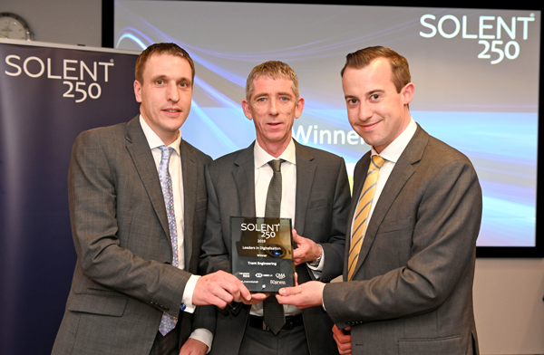 AWARD: From left, Trant Engineering’s James Henderson and Brendan Dowd receive The Solent 250 Award for Leaders in Digitisation. Right is James Tetley from RSM, one of the sponsors.