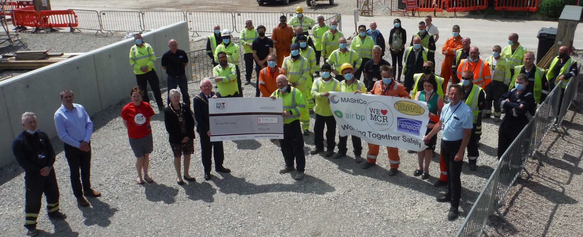 DONATION: A charity cheque for £3,680 is presented to the city’s Lord Mayor, Councillor Tommy Judge, at Manchester Airport. Holding the cheque with the Lord Mayor is Mick Satell, Trant Engineering Site Foreman.